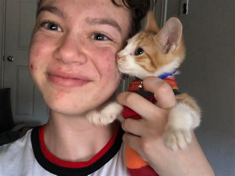 This is me with my brand new 2 month old kitten. His name is Gumbo and