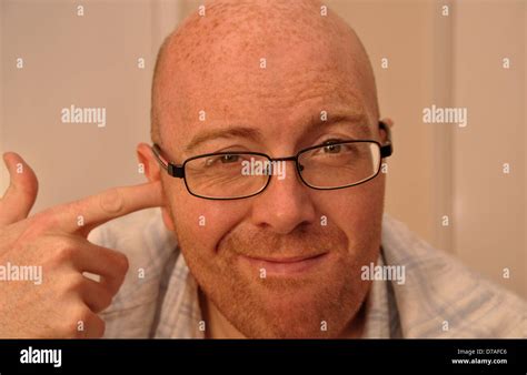 man scratching ear stock photo alamy