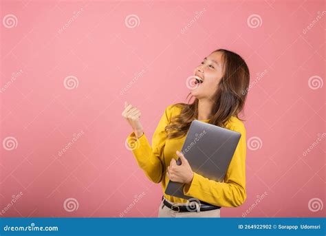 woman confident smiling face holding laptop computer raise hand