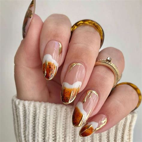 21 Pumpkin Spice Nail Ideas That Pair Well With a Latte