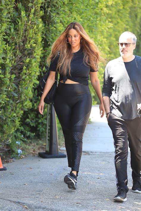 TYRA BANKS Arrives at Day of Indulgence Party in Brentwood 08/14/2022