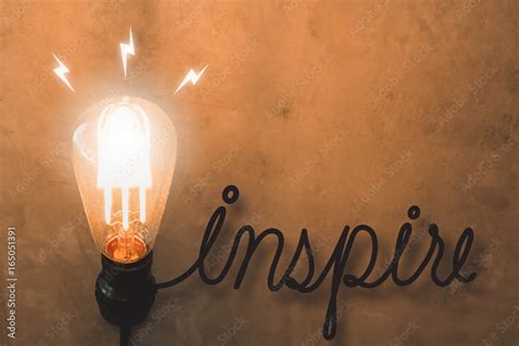 Light bulb inspire concept on old concrete wall background. Stock Photo ...