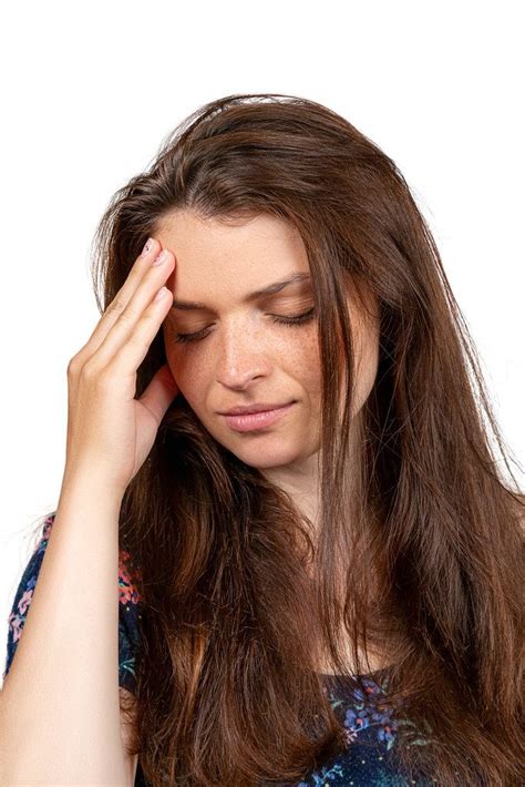 Woman with white towel on head, wears collagen patches under eyes ...