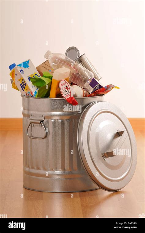 Full Garbage Can Stock Photo - Alamy