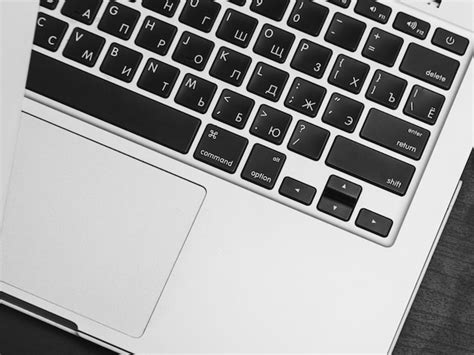 Premium Photo | Macbook laptop keyboard with russian-english layout