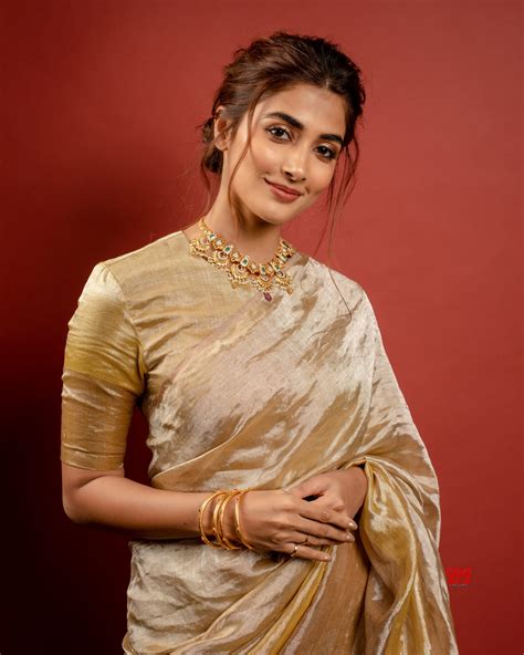 actress pooja hegde  hd stills   golden saree social news xyz