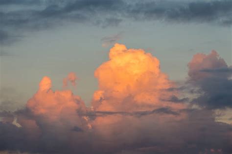 Fluffy Clouds Sunset Stock Photos, Pictures & Royalty-Free Images - iStock