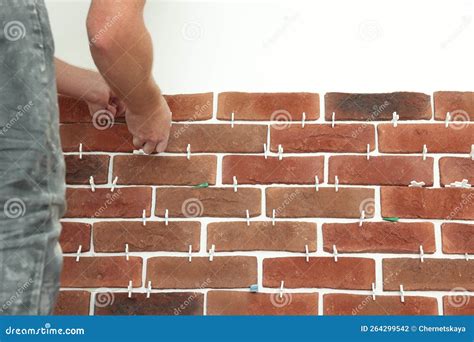 Professional Builder Gluing Decorative Brick on Wall, Closeup. Tiles ...