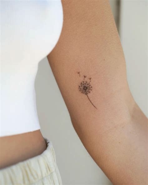 Small tattoos 🌼 | Dandelion tattoo design, Small shoulder tattoos