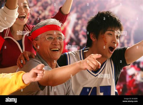 crowd cheering in stadium Stock Photo - Alamy