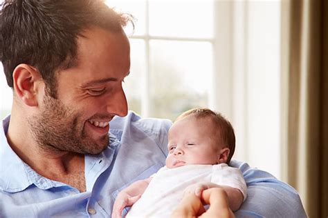Dads are happier than mums, study reveals