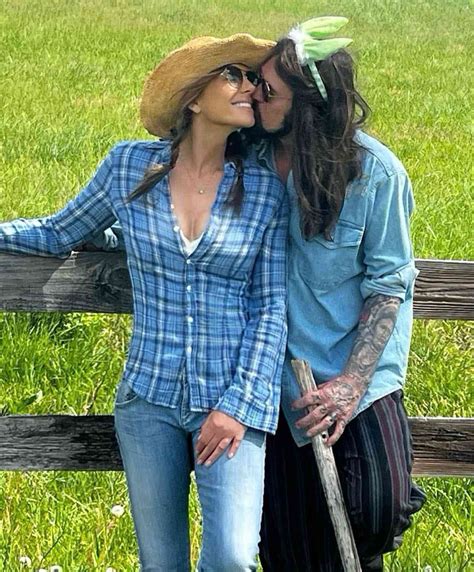 Elizabeth Hurley Cuddles with Billy Ray Cyrus in New Photos