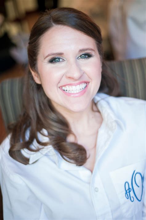 Bride Getting Ready in Monogrammed Button-Up with Half-Up Hairstyle