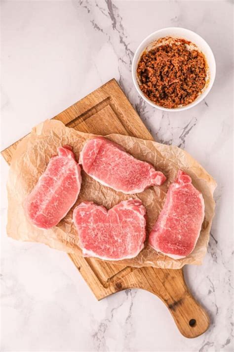 how long to cook frozen pork chops in oven