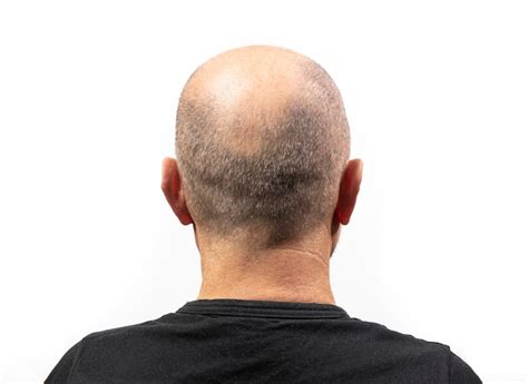 premium photo rear view  man  white background