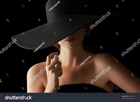 Elegant Woman Applying Perfume On Her Body Stock Photo 34951252 ...