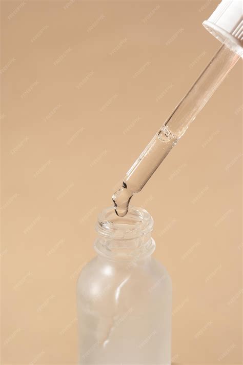 Premium Photo | Moisturizing serum for the face Serum in a pipette the