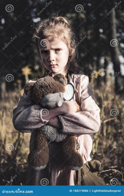 Child Holding Dirty Teddy Bear in Chernobyl, Post Apocalyptic Concept ...