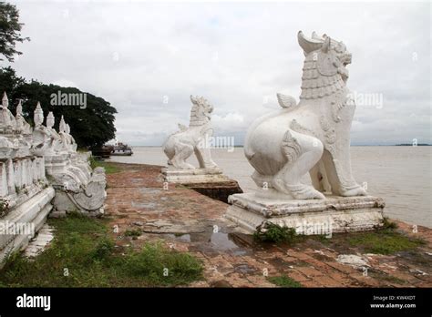 White statues big lion on the bank of river in Mingun, Myanmar Stock ...