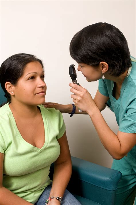picture female patient process receiving eye examination