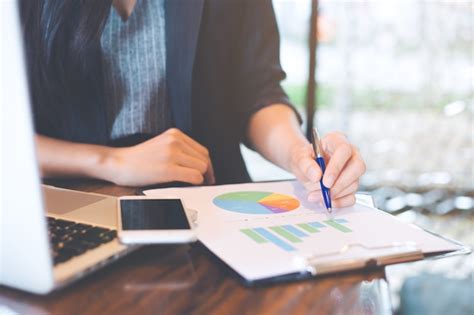 premium photo businessman working  analysis charts  graphs