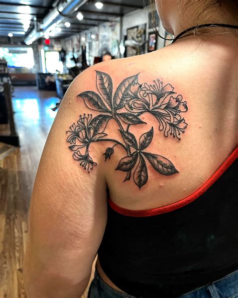 15 Unique Honeysuckle Tattoo Ideas for a Striking Design
