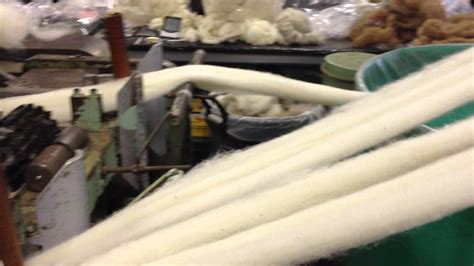 Battenkill Fiber Mill - fiber entering the pin drafting machine - YouTube