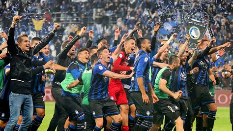 Atalanta players celebrate reaching next year's Champions League. They ...