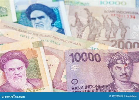 indonesian rupiah  iranian rial currency stock photo image