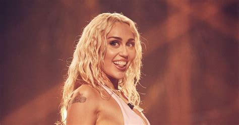 Miley Cyrus, 32, looks stunning in a teeny white swimsuit when she ...