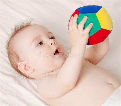 44+ Baby holding ball Free Stock Photos - StockFreeImages