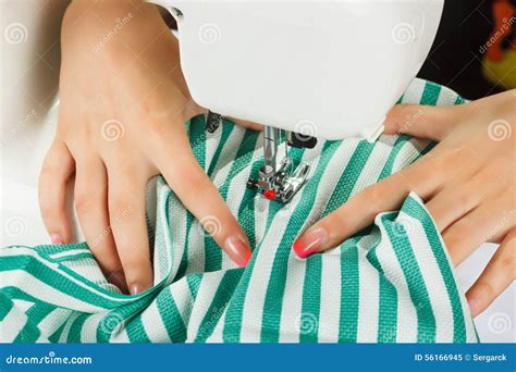 Seamstress Sew Fabric on the Sewing Machine. Stock Image - Image of ...