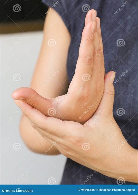Hand stretching stock photo. Image of female, forearm - 99896686