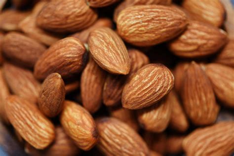 almonds top view close   roasted almond nuts background