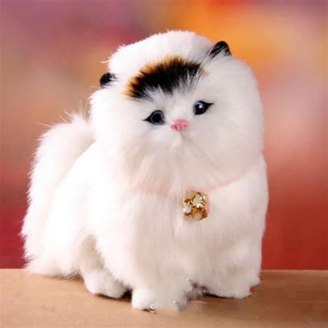 Фото игрушечных кошек