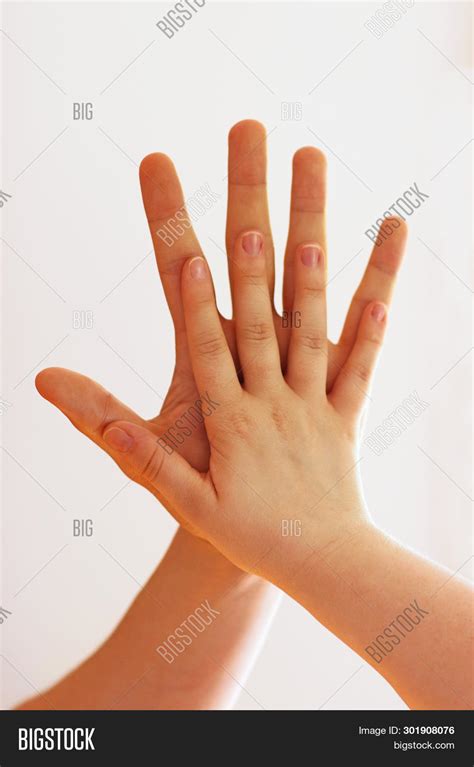 large hand small hand image photo  trial bigstock