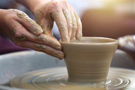 handmade pottery vase   potters wheel pottery hands pottery