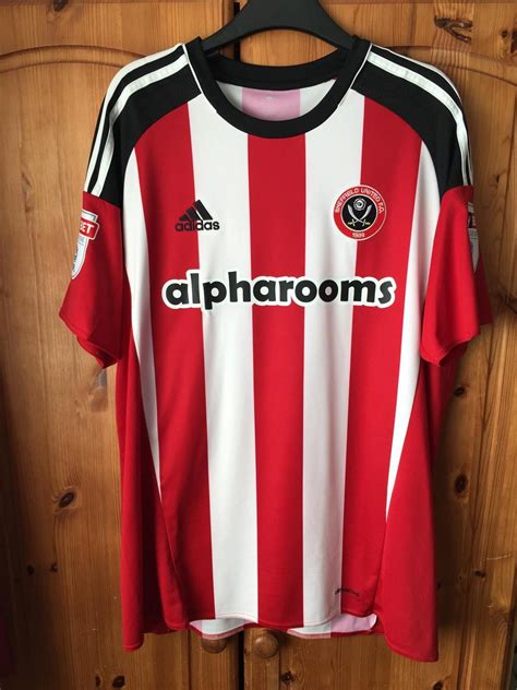 Sheffield United Home football shirt 2016 - 2017. Sponsored by Alpharooms