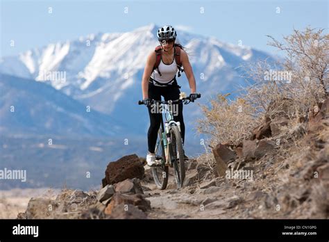 Young woman mountain biking on S Mountain, Salida, Colorado, USA. Mt ...