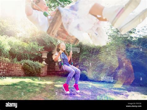 swinging girl  res stock photography  images alamy