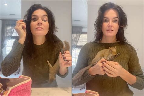 Angie Harmon Does Her Makeup While Her Pet Squirrel Crawls Across Her ...