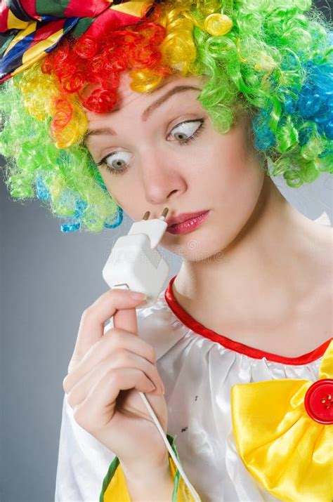 clown electric plug funny concept stock   royalty