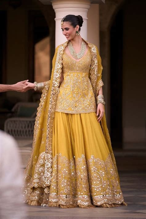 measure yellow heavy embroidered sharara garara womens suit