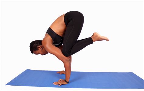 African Woman Doing Beginner Handstand Yoga Pose. Crow Pose - High ...