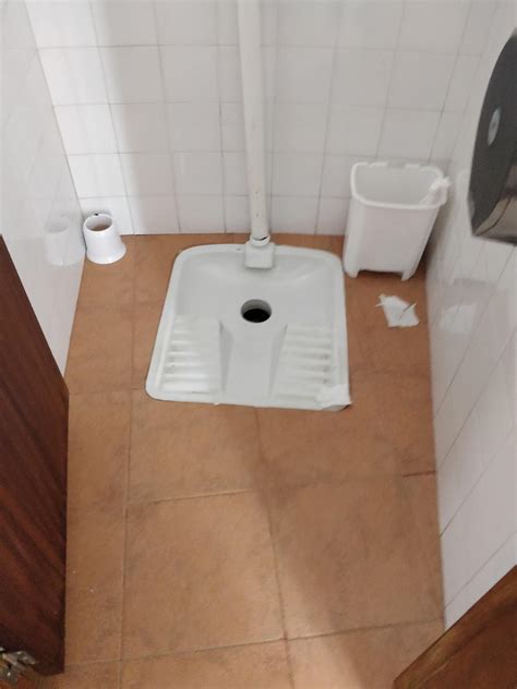 The door in this public bathroom stall I saw in Europe goes all the way