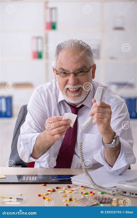 Old Drug Addicted Employee Sitting in the Office Stock Image - Image of ...