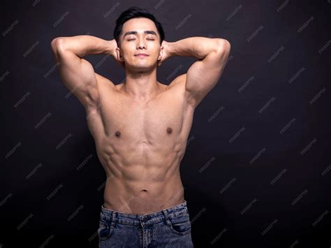 Premium Photo | Portrait of young asian bodybuilder man