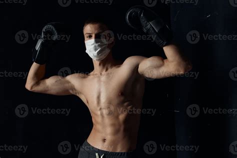 guy in medical mask athlete nude torso bodybuilder 21990828 Stock Photo