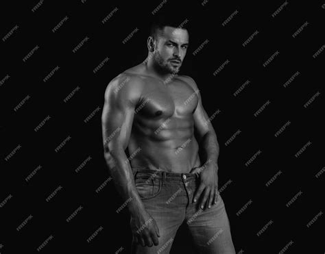 Premium Photo | Sexy man with muscular body and bare torso on black