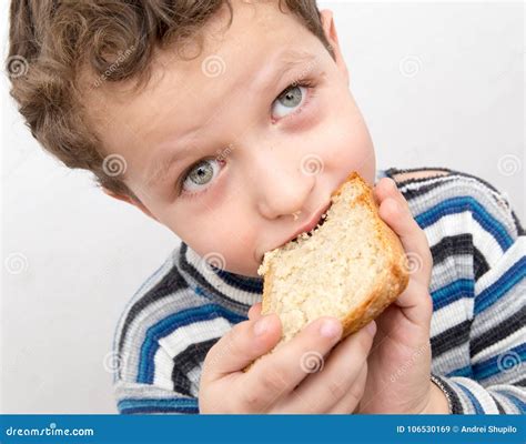 boy eats bread stock image image  tasty cute male